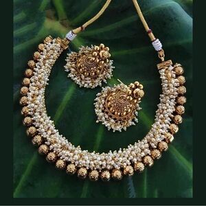 Pearl 1 gm gold traditional Indian necklace . Comes with Jhumka same style